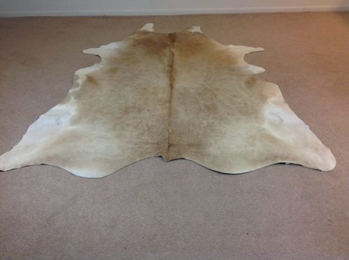 BUTTER-CREAM-AND-WHITE-COWHIDE-RUG